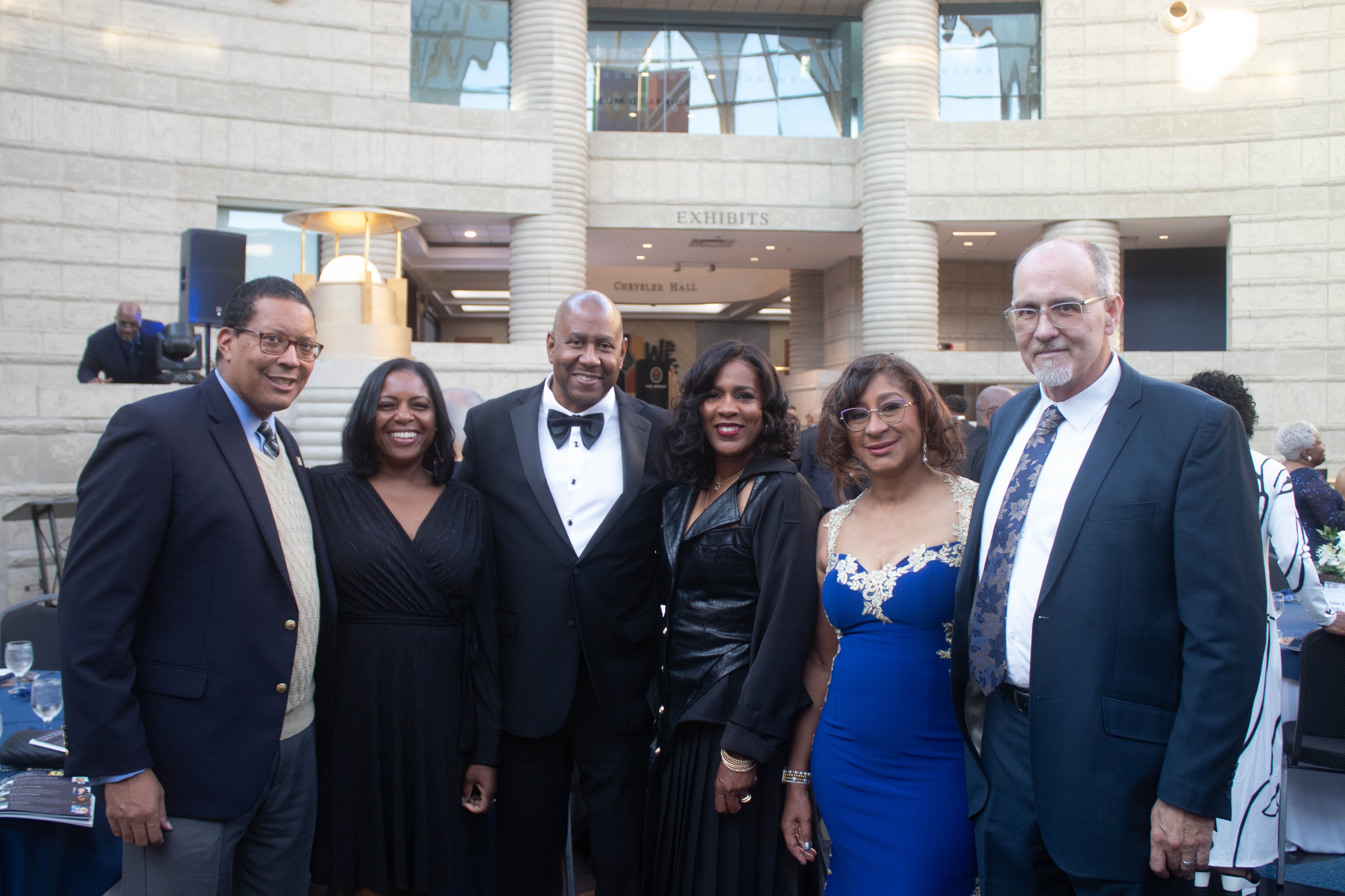 Group portrait at formal museum event